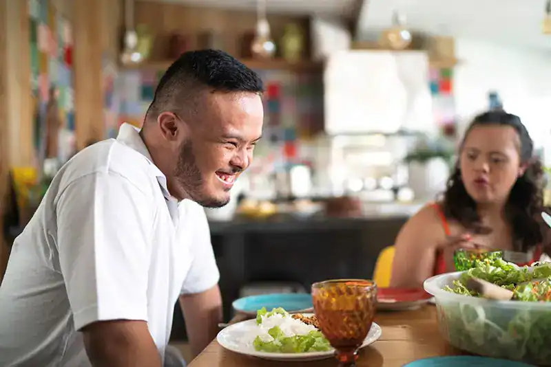 Empowering Weight Loss: A Comprehensive Guide for Individuals with Disabilities 2 Image of a disabled man and balance around nutrition to aid weight loss Knutsford