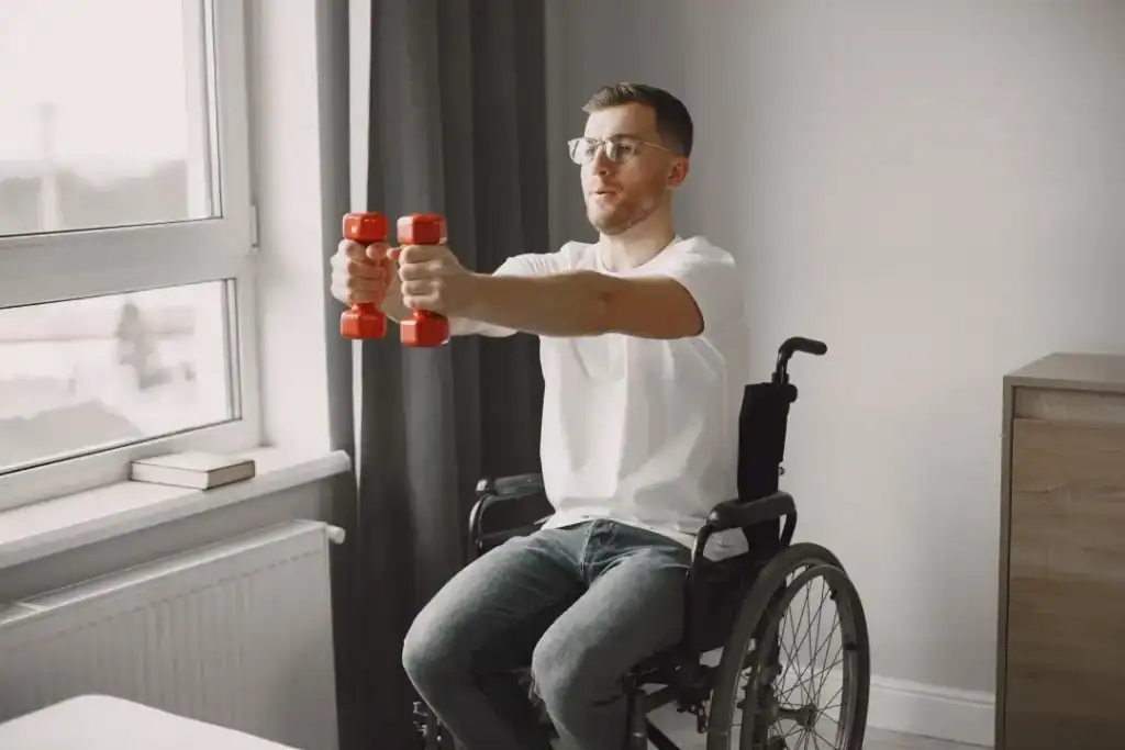 Empowering Weight Loss: A Comprehensive Guide for Individuals with Disabilities 1 Image of man doing exercise in his wheelchair to aid weight loss Knutsford